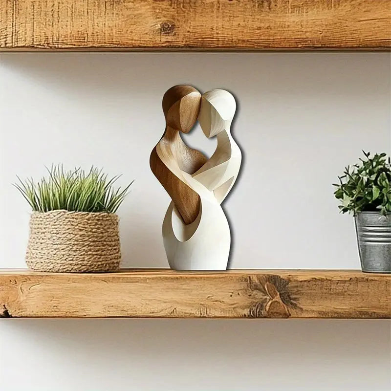 Statue de couple en bois